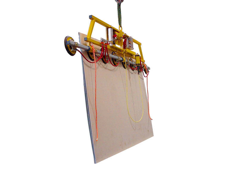 Vacuum lifter Kombi 7001-A-1000 was designed for use in the glass storeThis single-row vacuum lifting device is usually supplied with electrical power from the crane track. This means that plate materials measuring up to 6 metres in width can be moved around while suspended vertically.