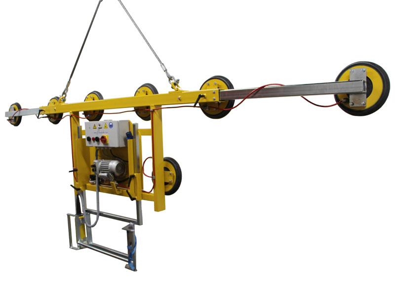 The Kombi 7001-AB vacuum lifting device is intended for glass storage. The original single-row vacuum lifting device was extended with a guide handle and at least two suction cups suspended at a lower point. This means that plate materials measuring up to 6 metres in width can be moved around while suspended vertically.