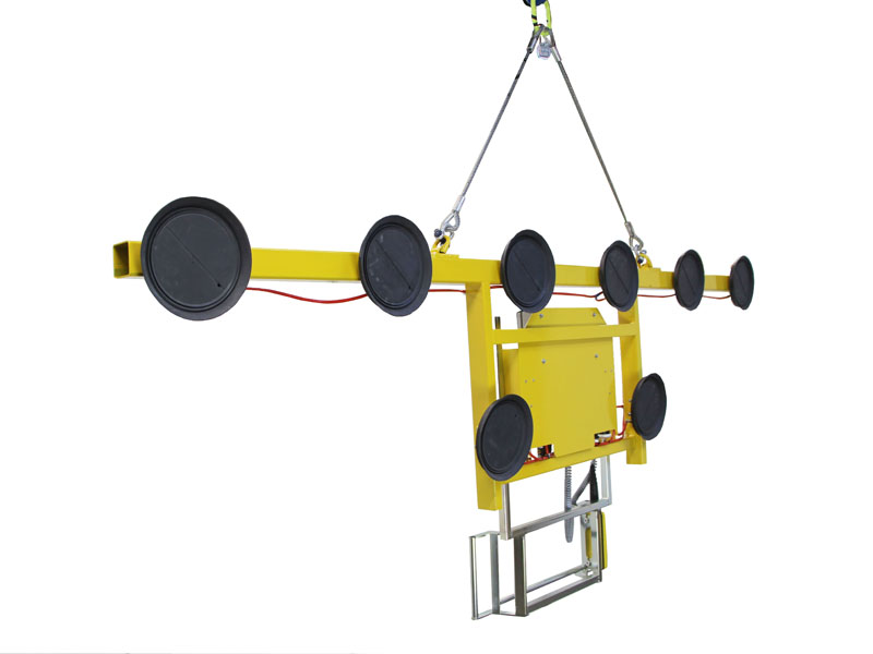 The Kombi 7011-AB-20 vacuum lifting device is intended for glass storage. The original single-row vacuum lifting device was extended with a guide handle and at least two suction cups suspended at a lower point. This means that plate materials measuring up to 6 metres in width can be moved around while suspended vertically.